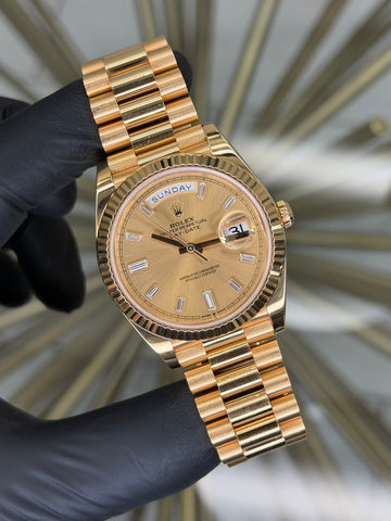 Rolex Day-Date 40 Champagne Baguette Diamond Dial on President 228238 2023 Complete