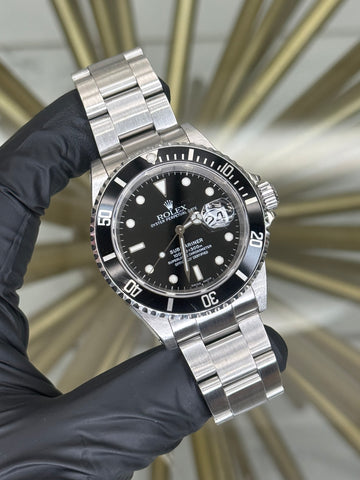 Rolex Submariner Black Dial on Oyster 16610 2002 Papers