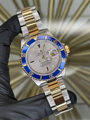 Rolex Submariner Silver Diamond Serti Dial on Oyster 16613