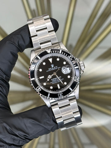 Rolex Submariner Black Dial on Oyster 16610 Open Date Papers